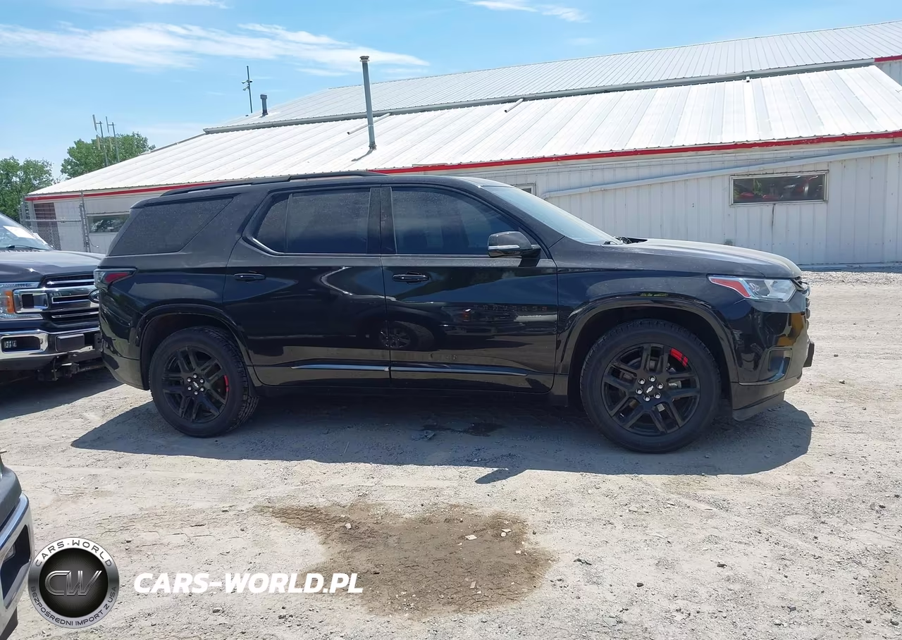 2018 Chevrolet Traverse Premier VIN:1GNEVJKW0JJ103405 - 13