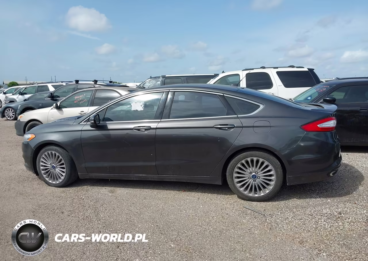 2016 Ford Fusion Titanium VIN:3FA6P0K98GR390010 - 14
