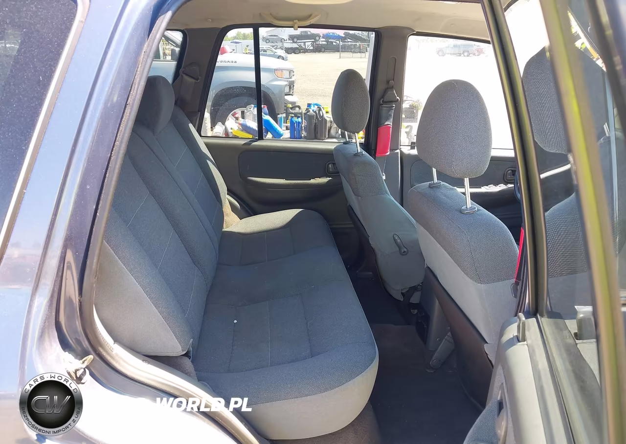 2002 Kia Sportage VIN:KNDJA723225117179 - 8