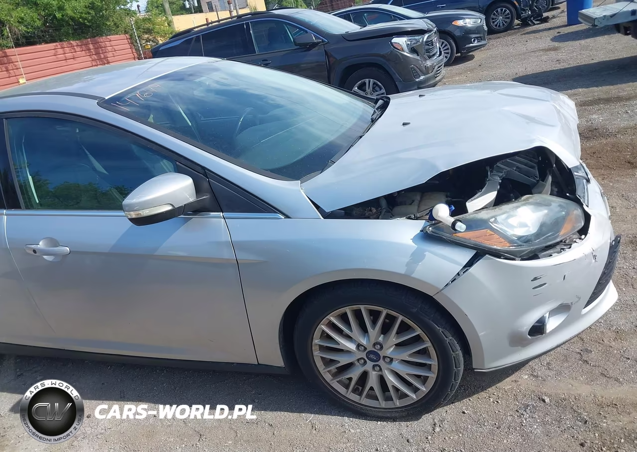 2014 Ford Focus Titanium VIN:1FADP3N22EL147649 - 13