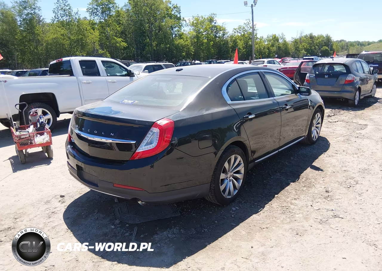 2015 Lincoln Mks VIN:1LNHL9EK3FG603142 - 4