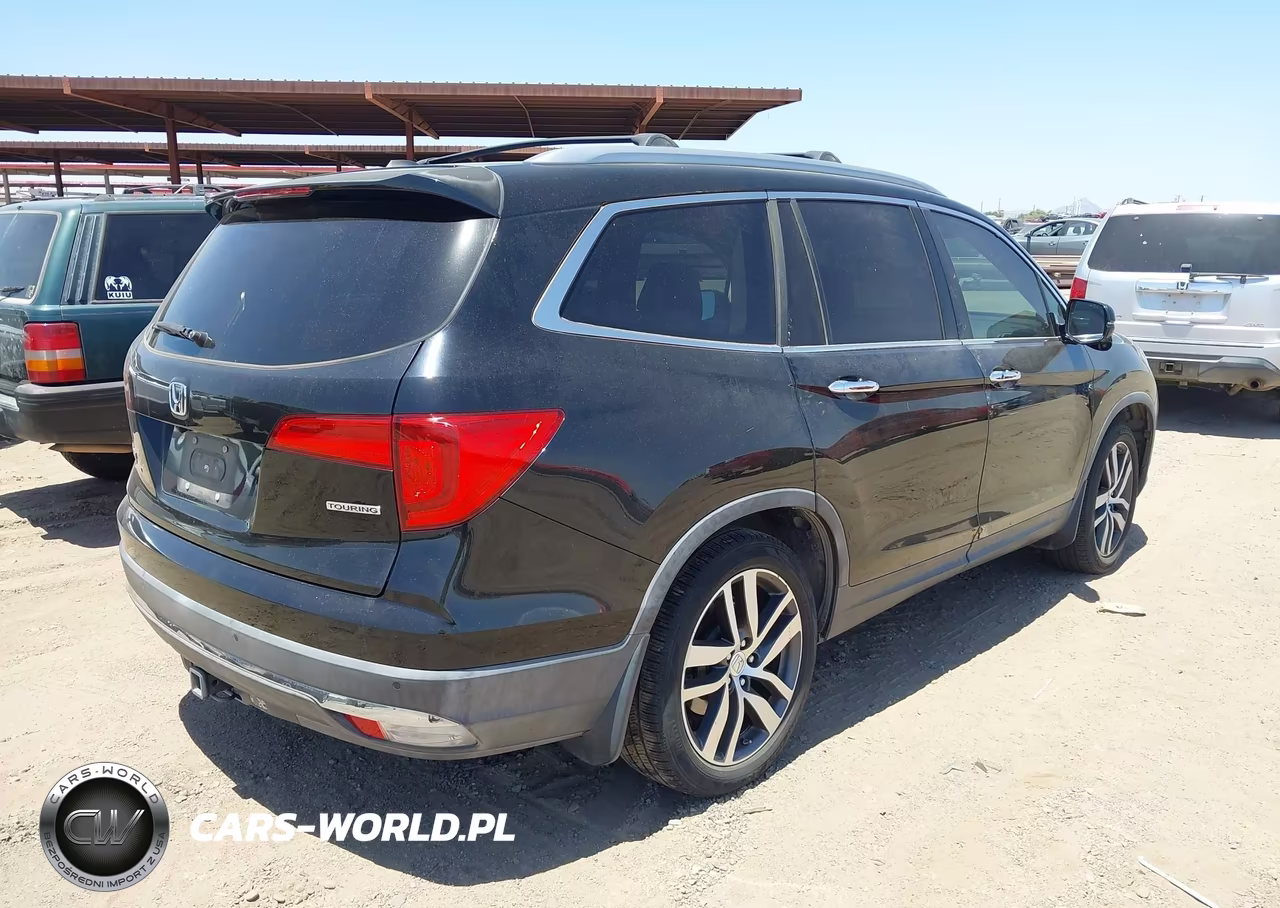 2016 Honda Pilot Touring VIN:5FNYF5H95GB053483 - 4
