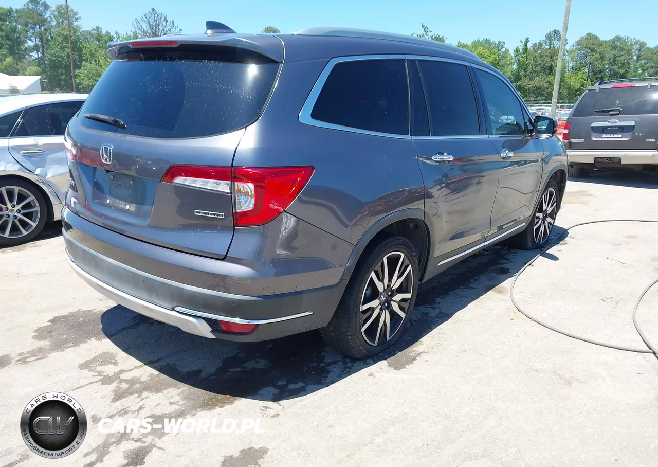 2019 Honda Pilot Touring VIN:5FNYF5H69KB043621 - 4