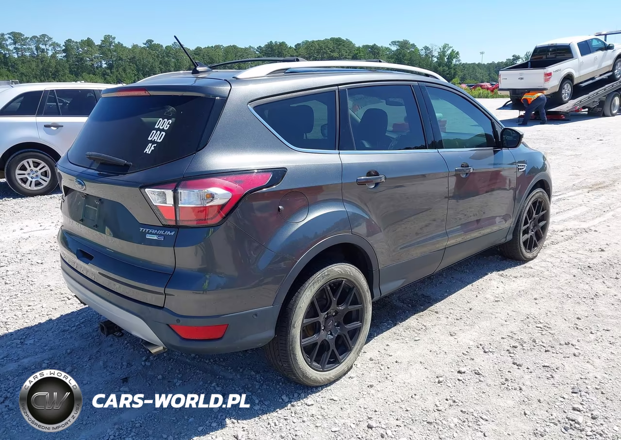 2018 Ford Escape Titanium VIN:1FMCU9J96JUB24332 - 4