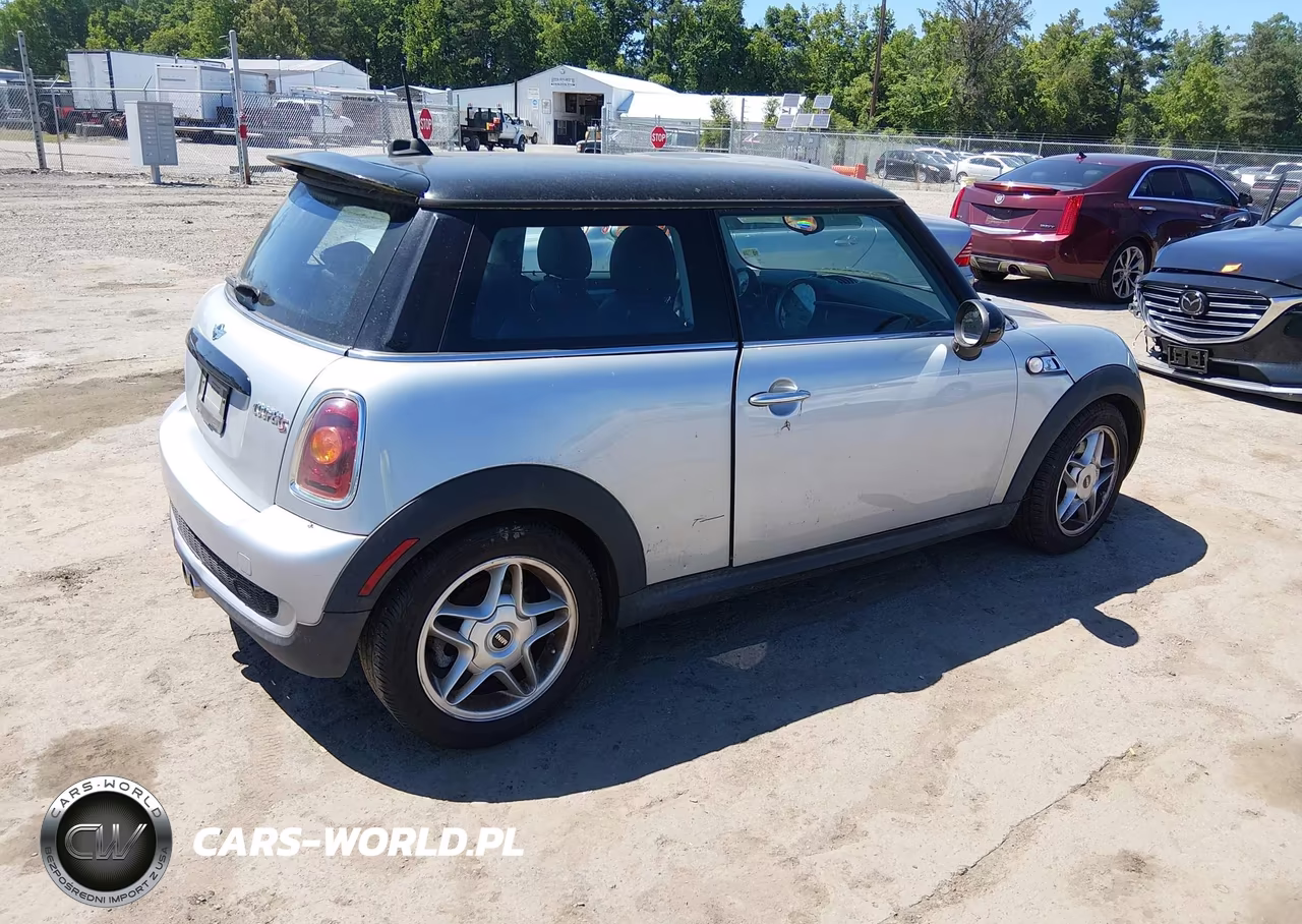 2009 Mini Cooper S VIN:WMWMF73539TT95879 - 4
