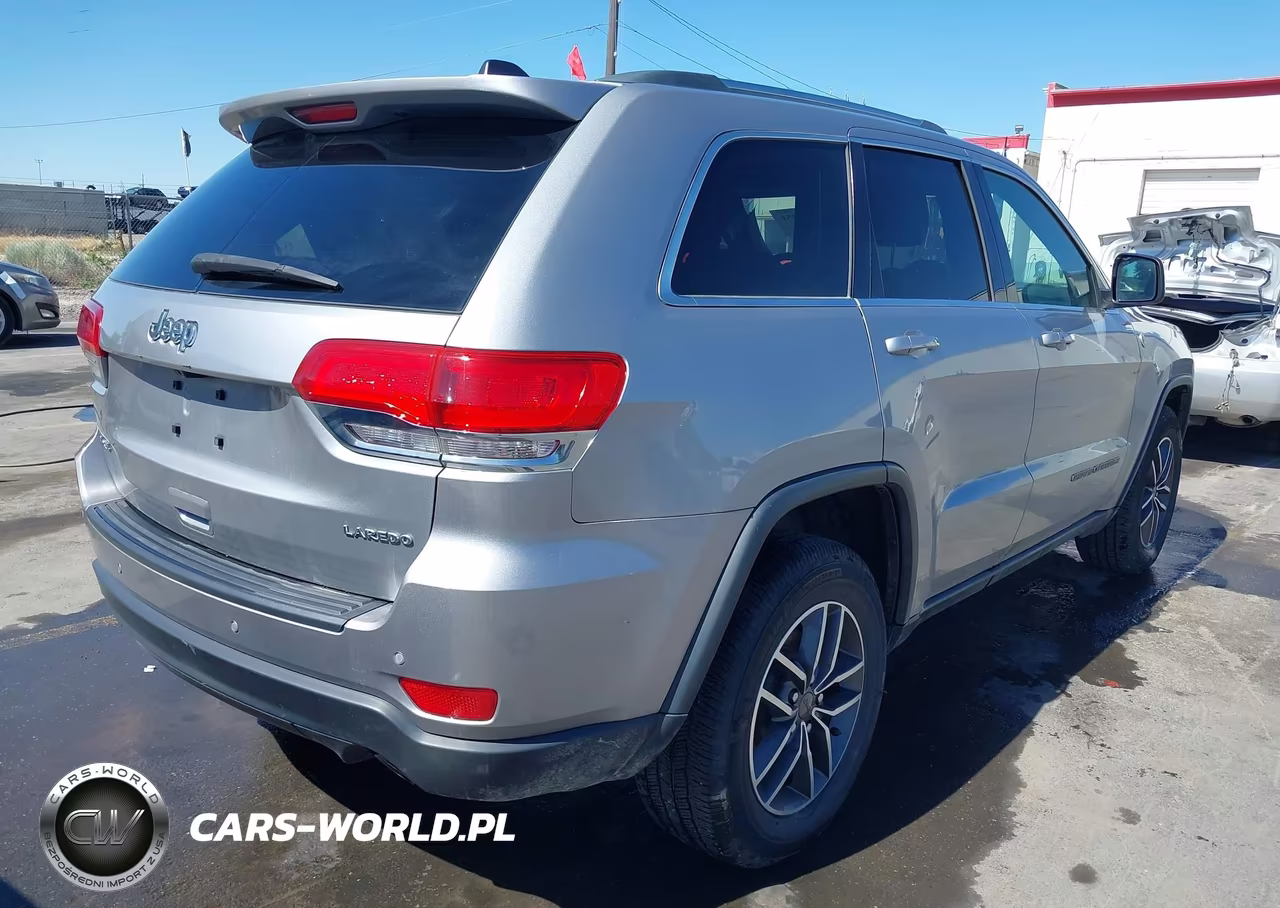 2019 Jeep Grand Cherokee Laredo E 4X4 VIN:1C4RJFAGXKC548124 - 4