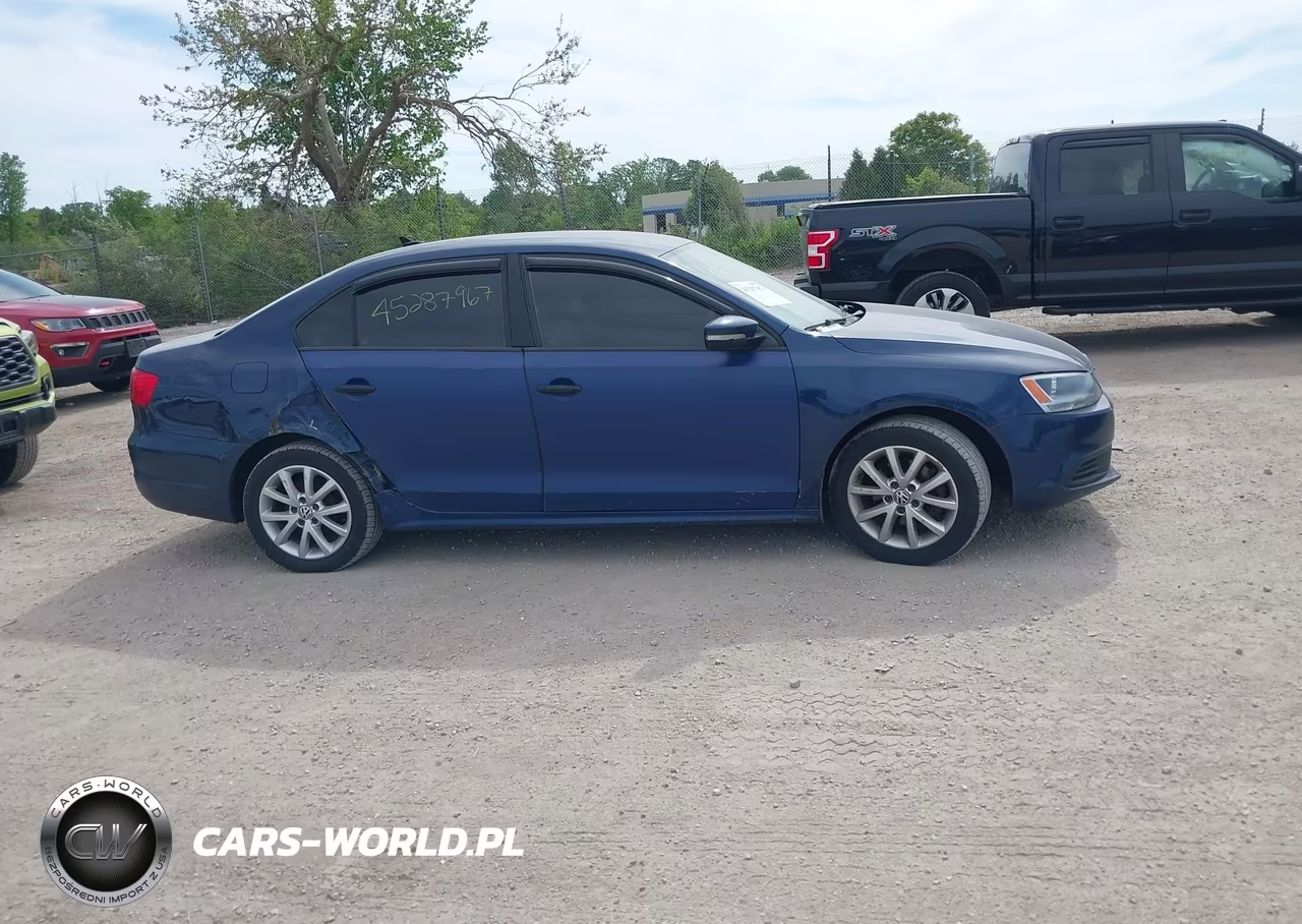 2011 Volkswagen Jetta Sedan VIN:3VWDX7AJ0BM021456 - 13