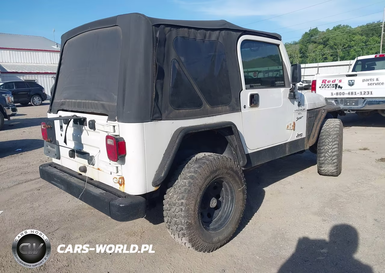 1999 Jeep Wrangler Sport VIN:1J4FY19S8XP472035 - 4