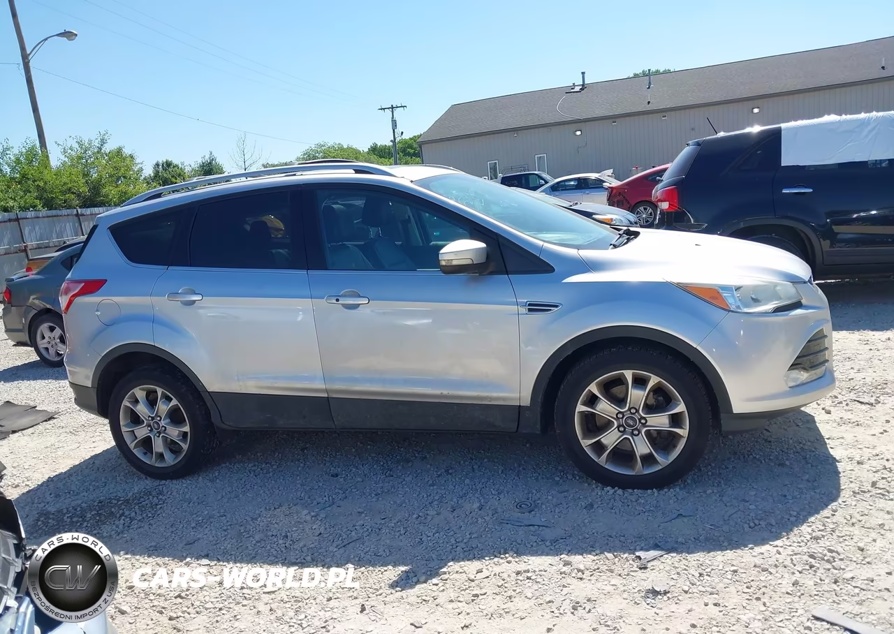 2015 Ford Escape Titanium VIN:1FMCU9J90FUA05523 - 13
