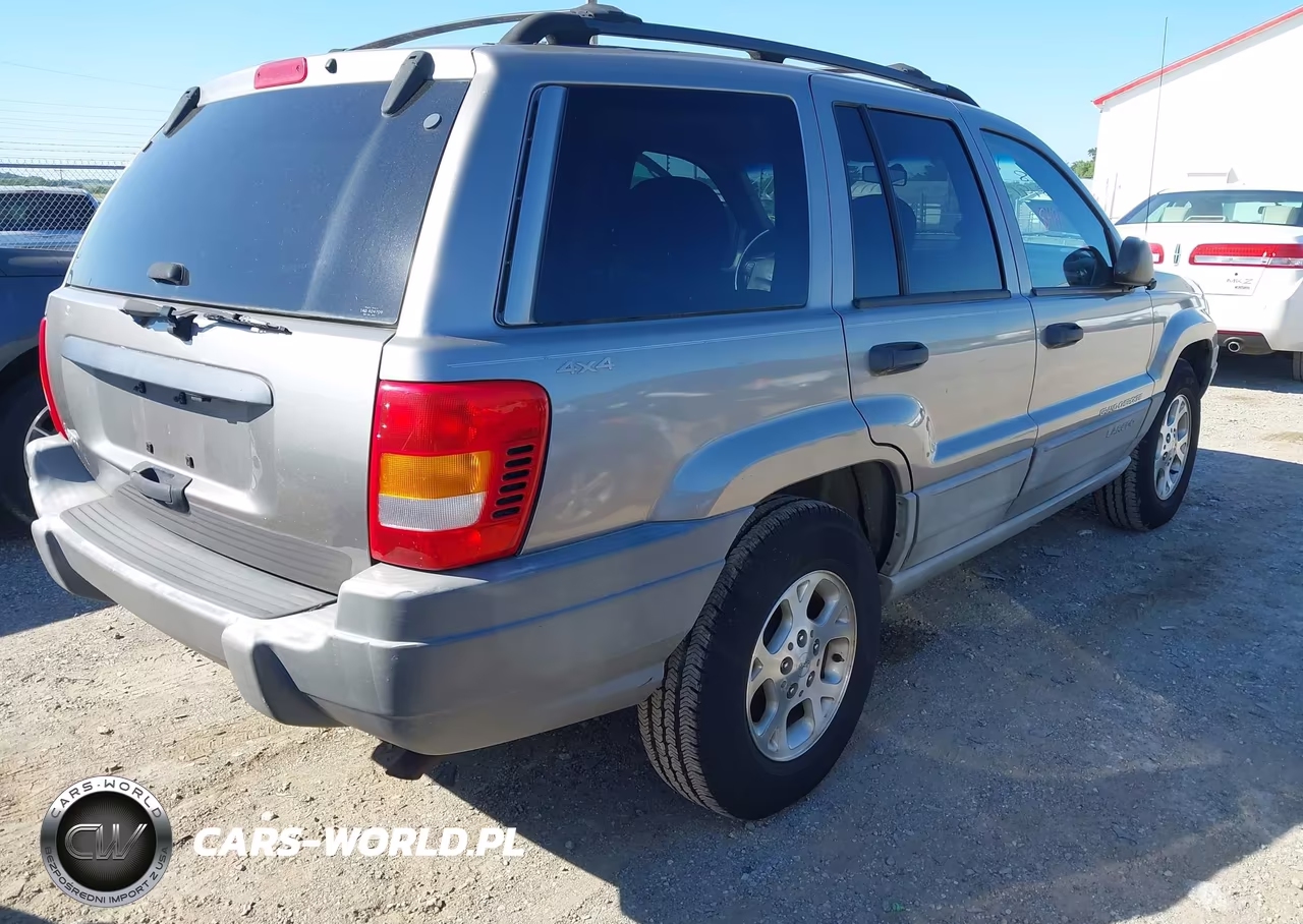 1999 Jeep Grand Cherokee Laredo VIN:1J4GW58S5XC561541 - 4