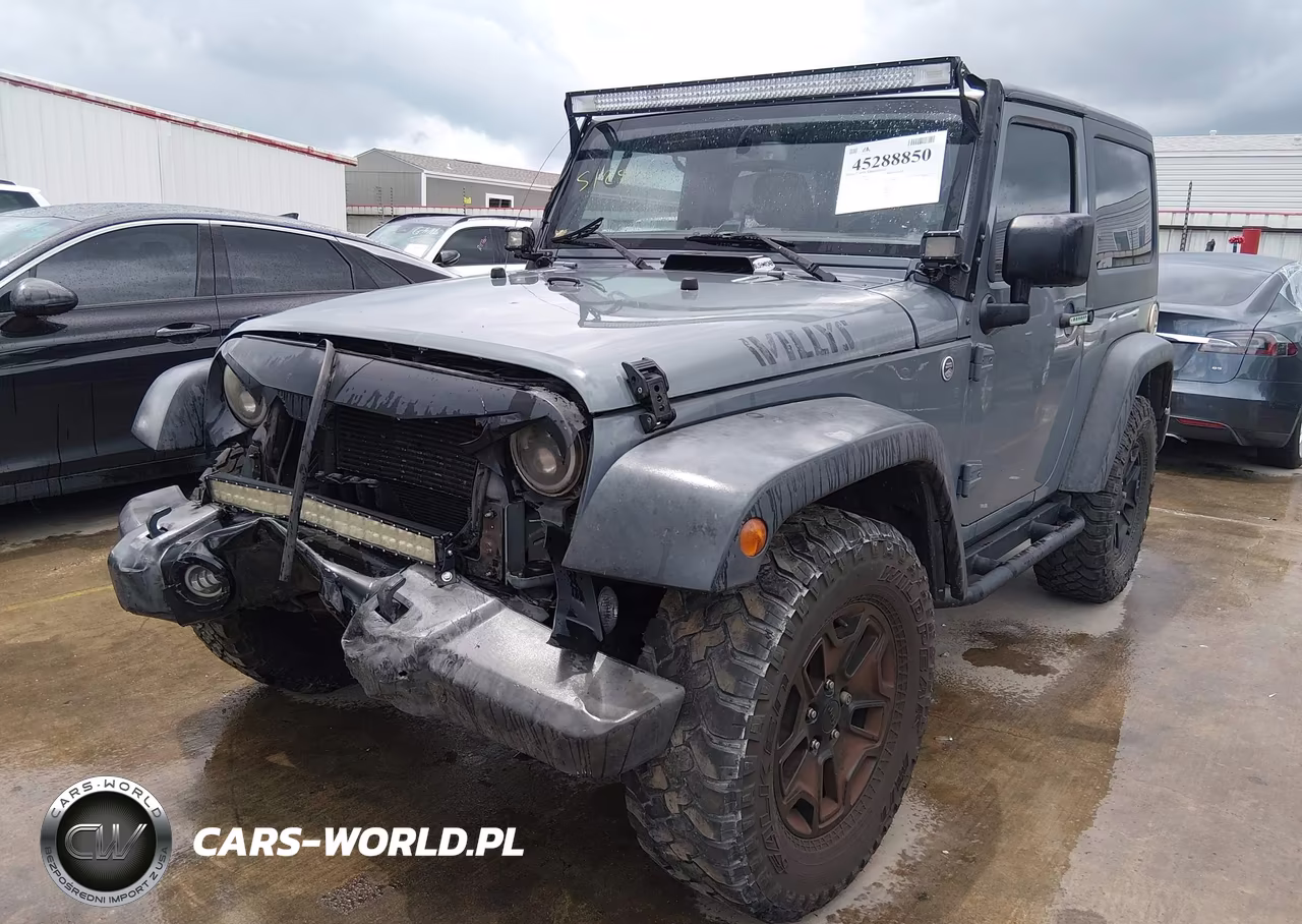2015 Jeep Wrangler Willys Wheeler VIN:1C4AJWAG9FL700011 - 2
