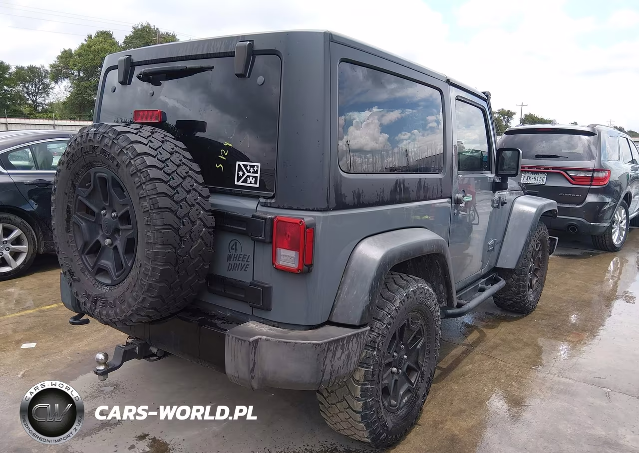 2015 Jeep Wrangler Willys Wheeler VIN:1C4AJWAG9FL700011 - 4