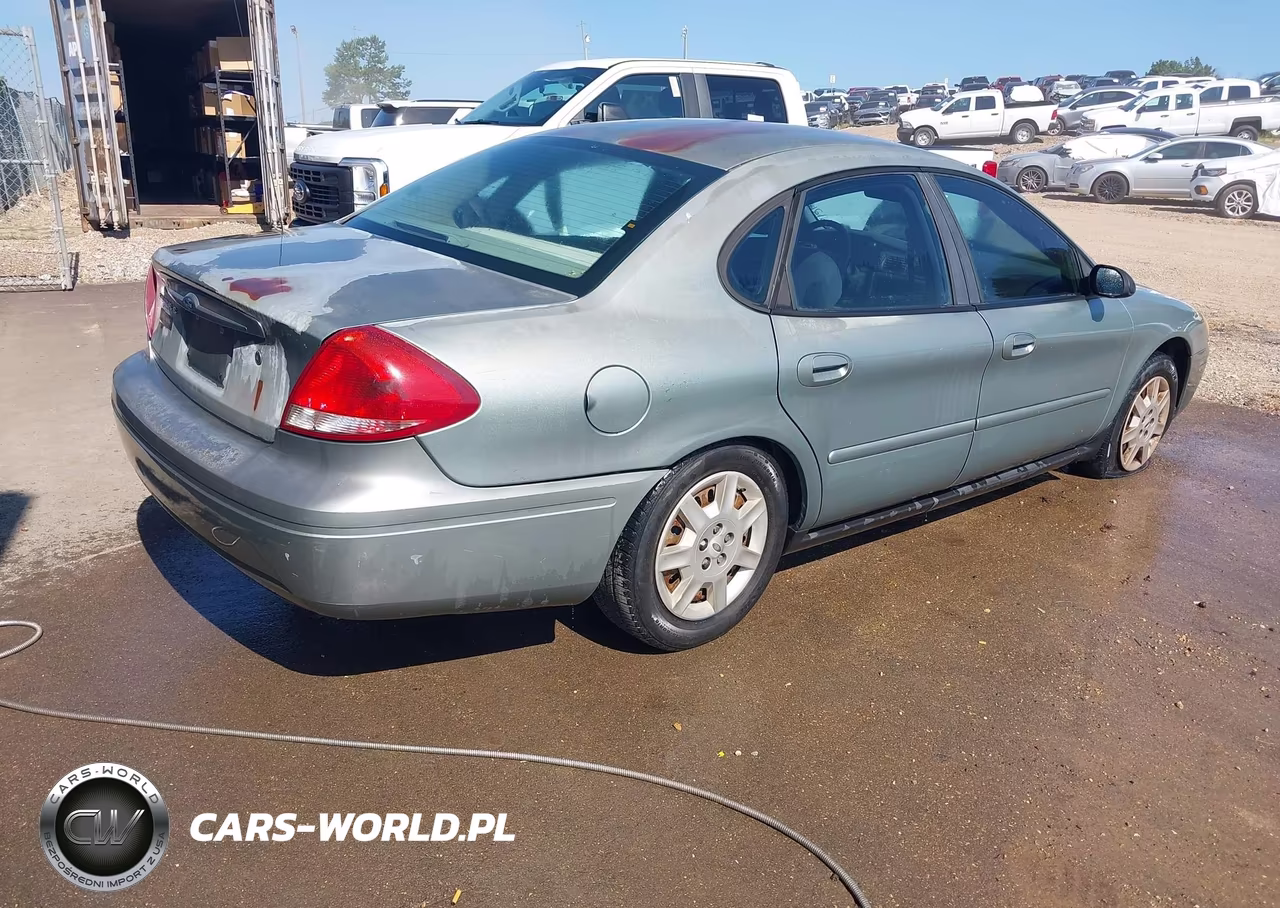 2007 Ford Taurus Se VIN:1FAFP53UX7A216126 - 4