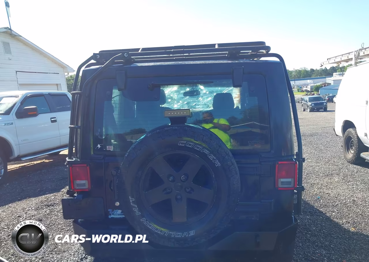 2014 Jeep Wrangler Sport VIN:1C4AJWAGXEL289555 - 17