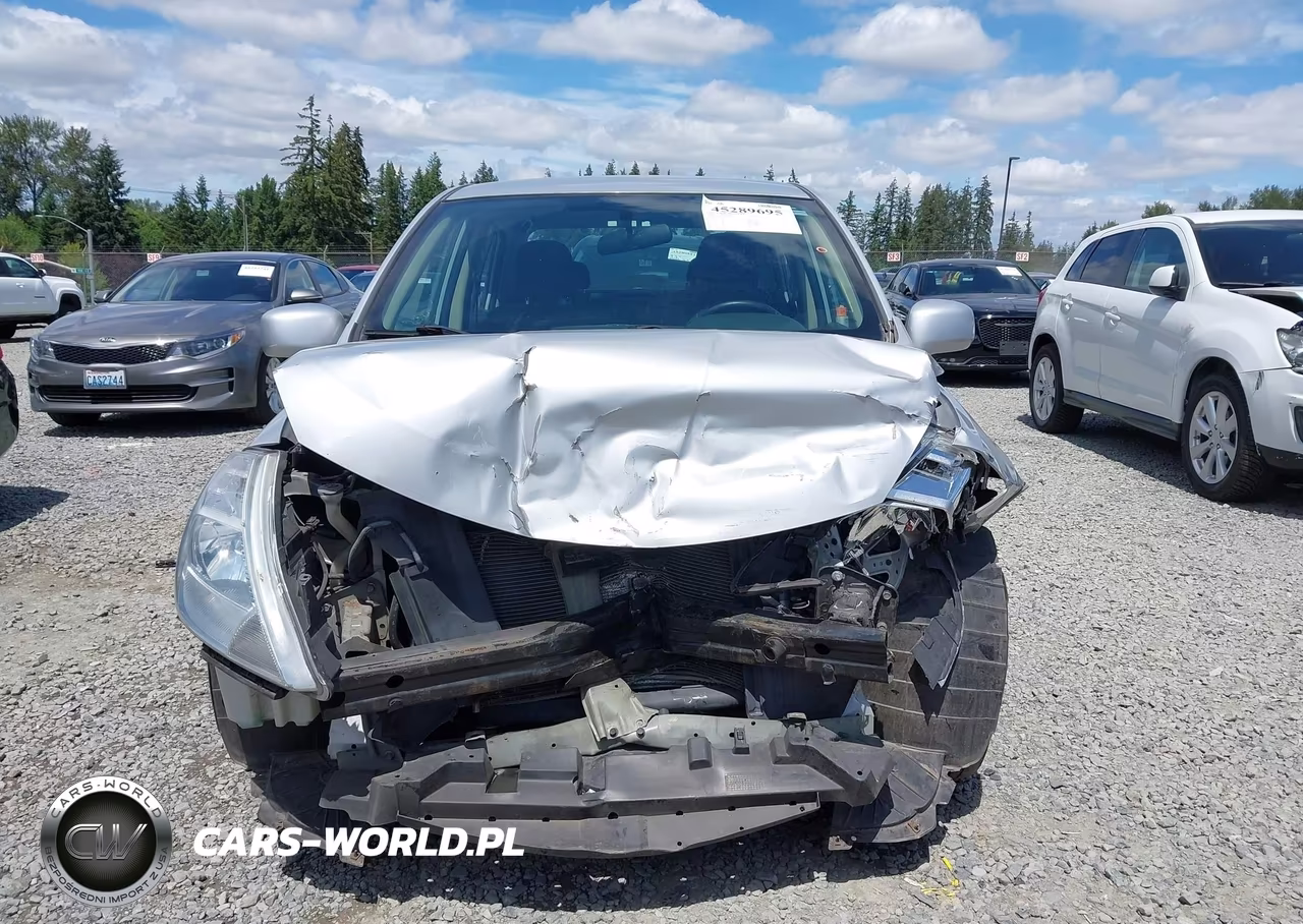 2010 Nissan Versa 1.8Sl VIN:3N1BC1AP2AL360833 - 13