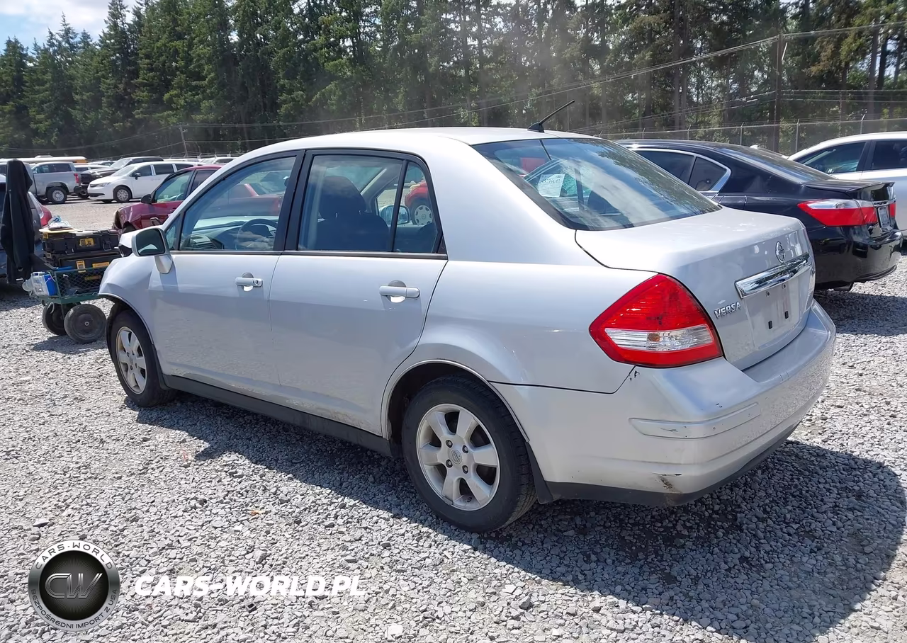 2010 Nissan Versa 1.8Sl VIN:3N1BC1AP2AL360833 - 3
