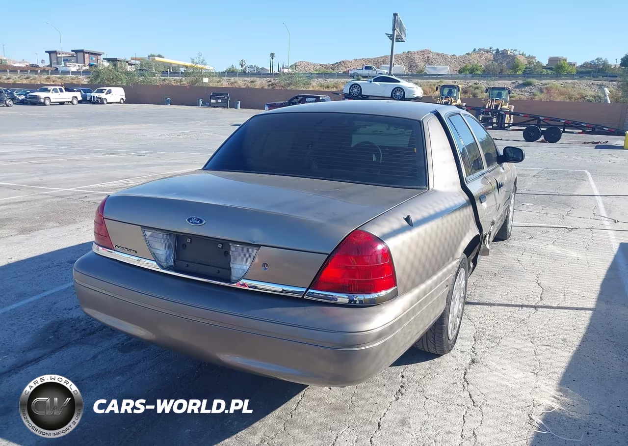 2005 Ford Crown Victoria Standard VIN:2FAFP73WX5X130557 - 4