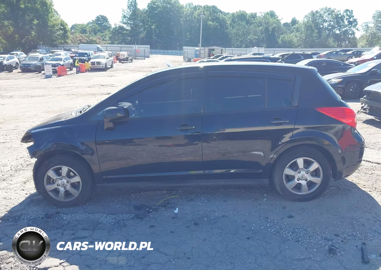 2009 Nissan Versa 1.8Sl VIN:3N1BC13EX9L420381 - 14