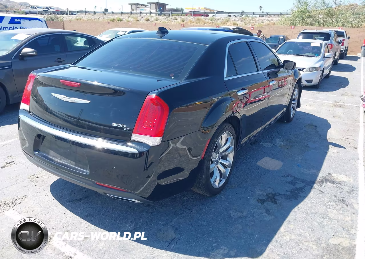 2015 Chrysler 300C VIN:2C3CCAEGXFH893982 - 4