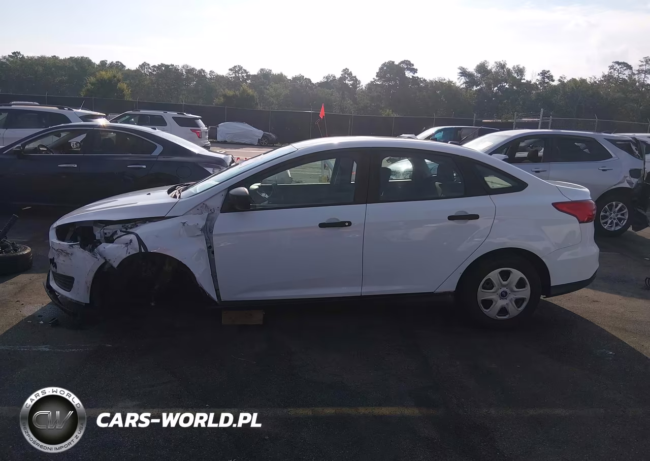 2016 Ford Focus S VIN:1FADP3E20GL339459 - 13