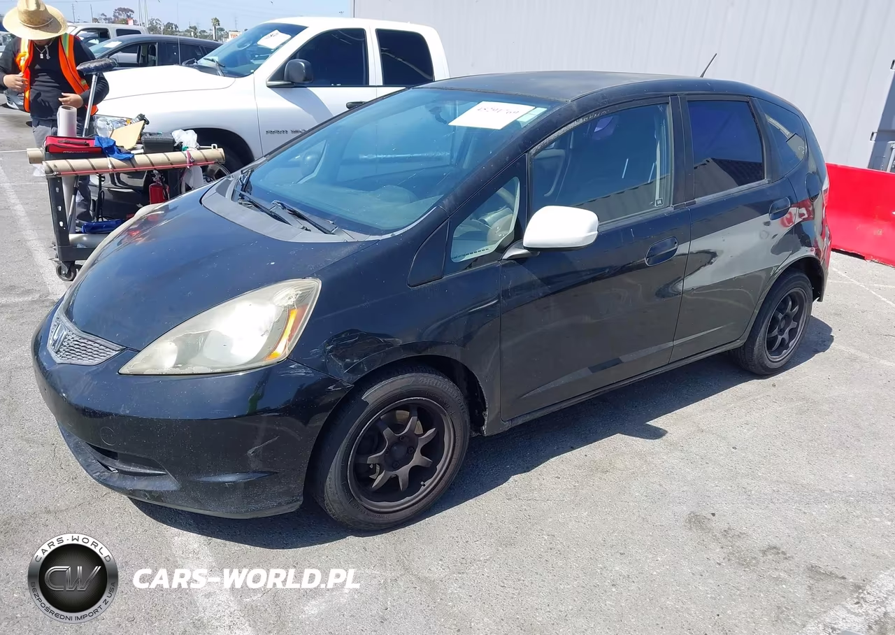 2009 Honda Fit VIN:JHMGE87289S038193 - 2