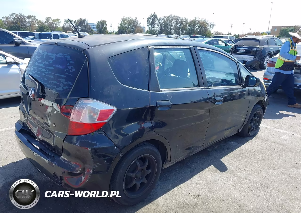 2009 Honda Fit VIN:JHMGE87289S038193 - 4