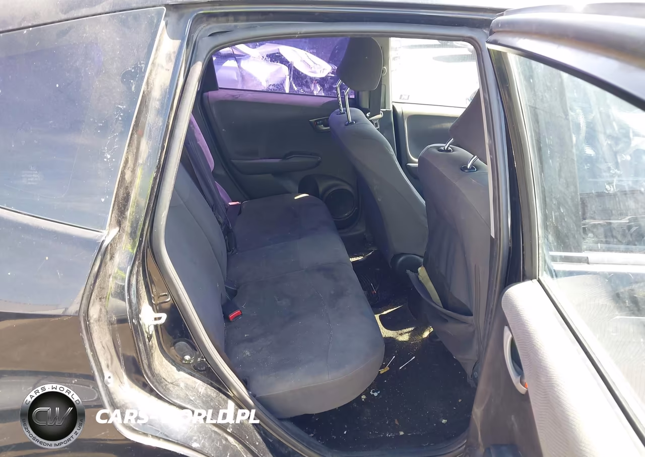 2009 Honda Fit VIN:JHMGE87289S038193 - 8