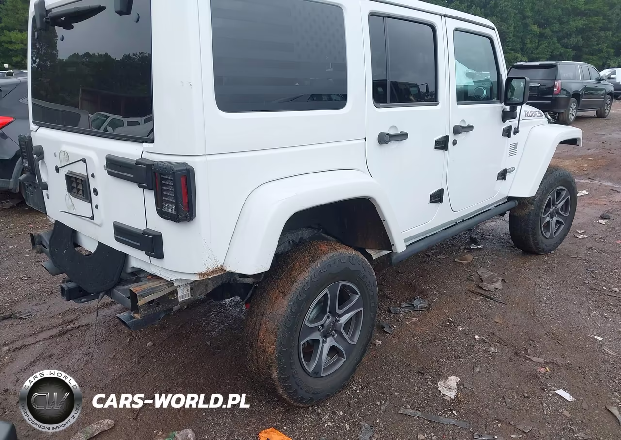 2016 Jeep Wrangler Unlimited Rubicon VIN:1C4BJWFG5GL135352 - 4