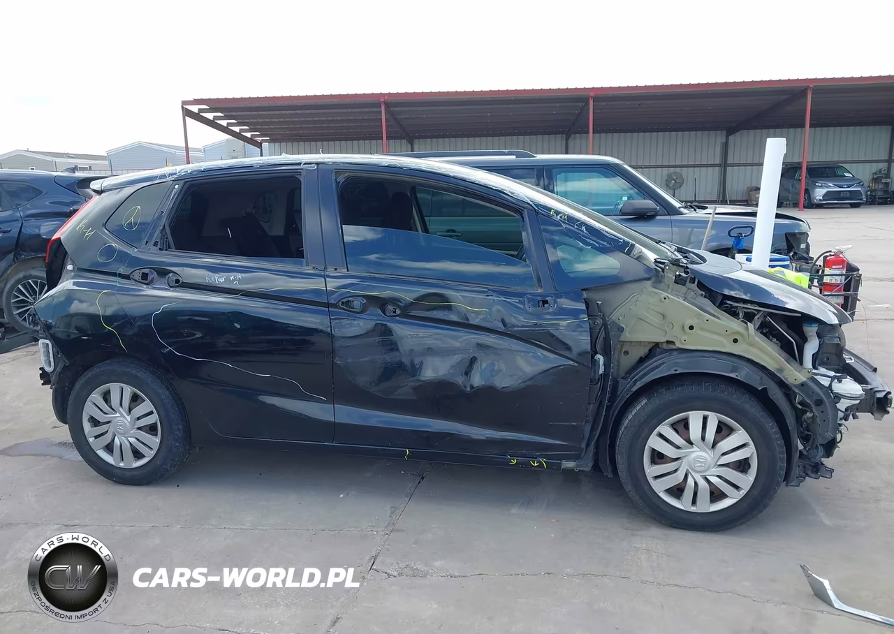 2015 Honda Fit Lx VIN:3HGGK5G54FM742416 - 14