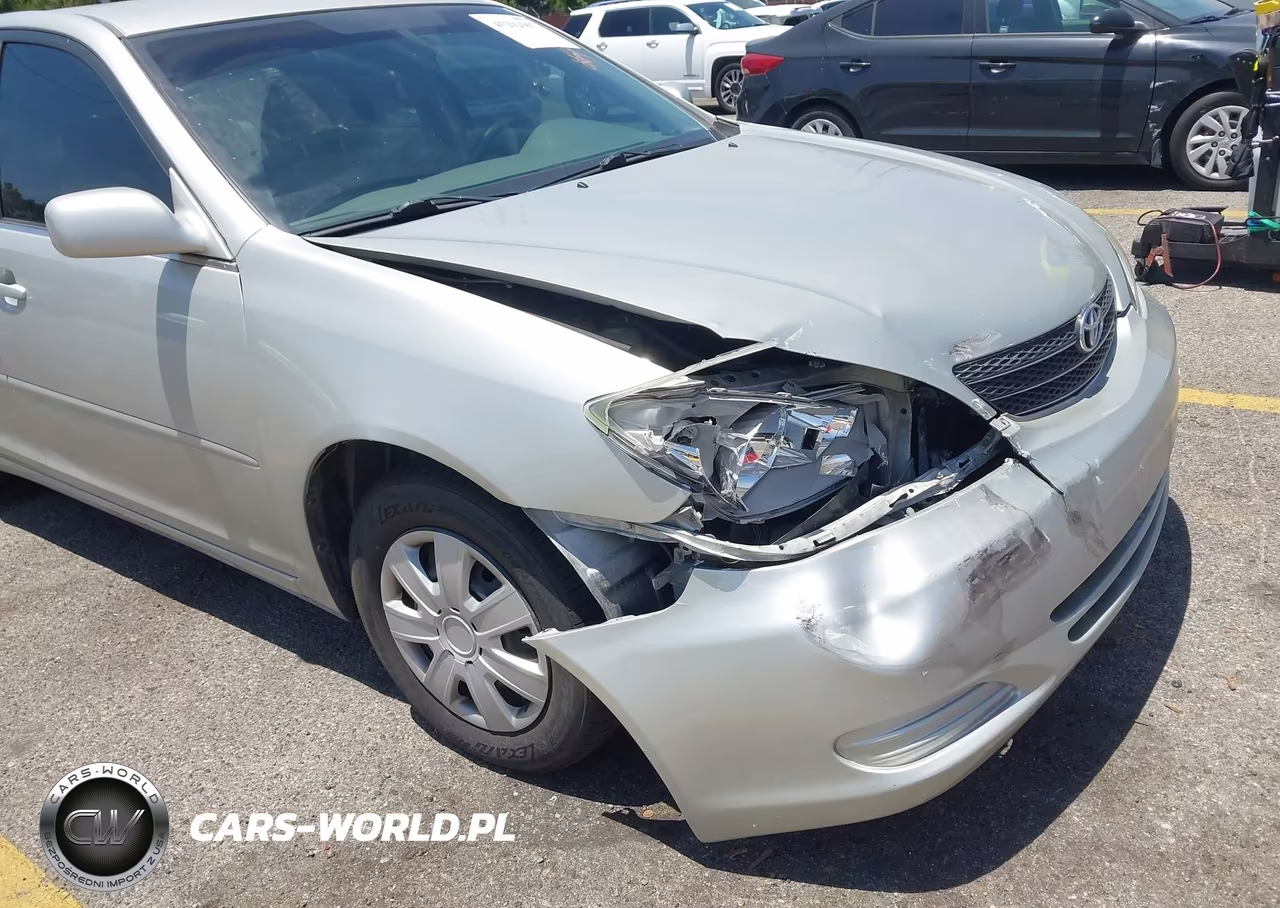 2002 Toyota Camry Le VIN:JTDBE32K320137513 - 13