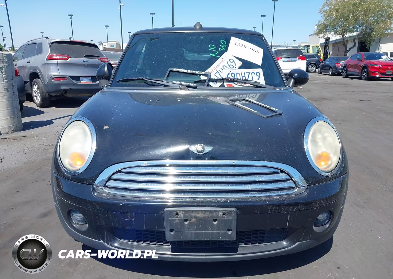 2009 Mini Cooper VIN:WMWMR33549TU95506 - 13