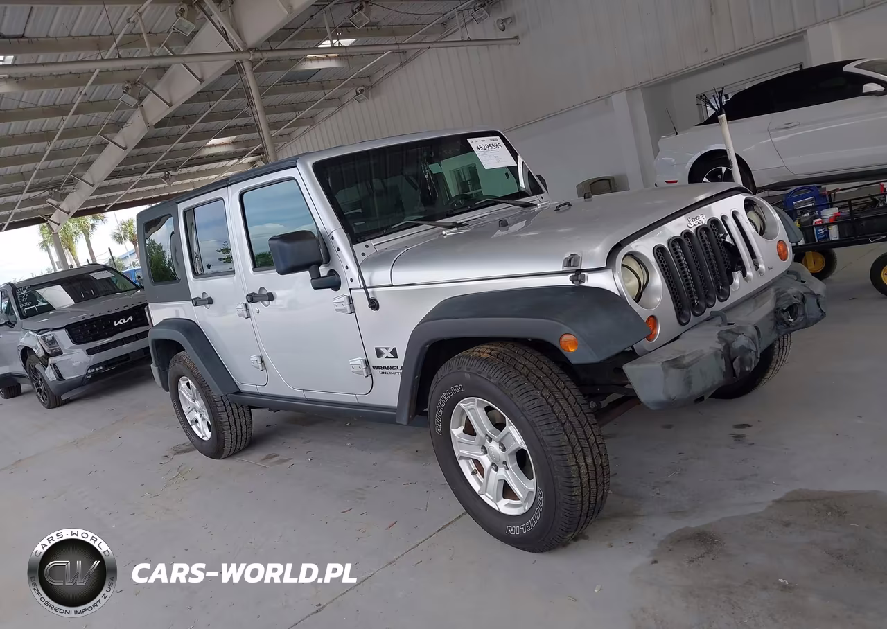 2009 Jeep Wrangler Unlimited X VIN:1J4GB39199L756874 - 13