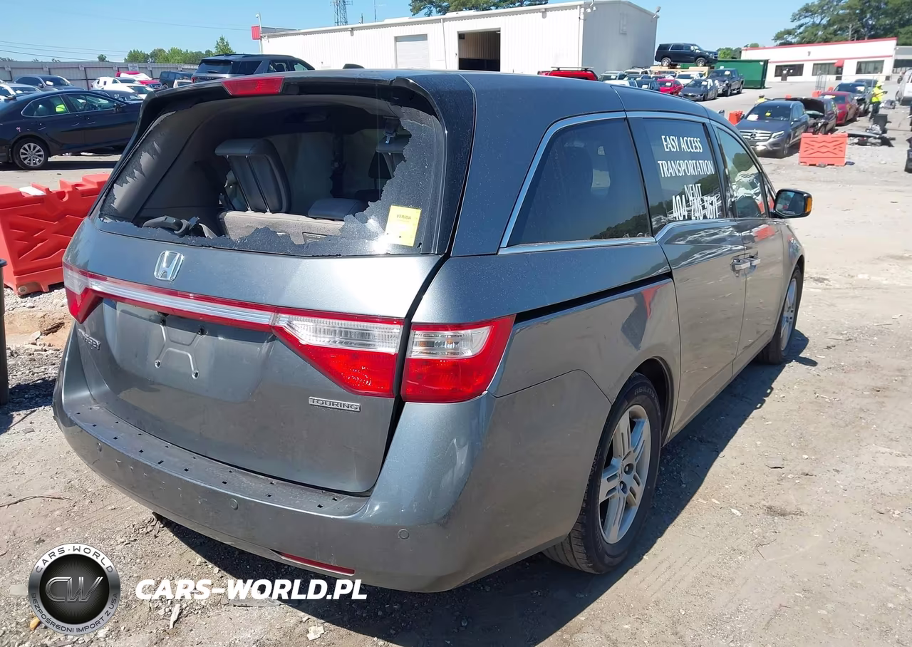 2012 Honda Odyssey Touring-Touring Elite VIN:5FNRL5H96CB004607 - 4
