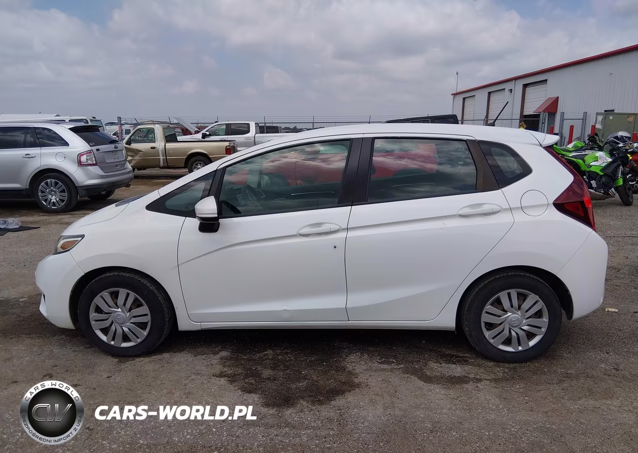 2015 Honda Fit Lx VIN:3HGGK5H59FM709068 - 14