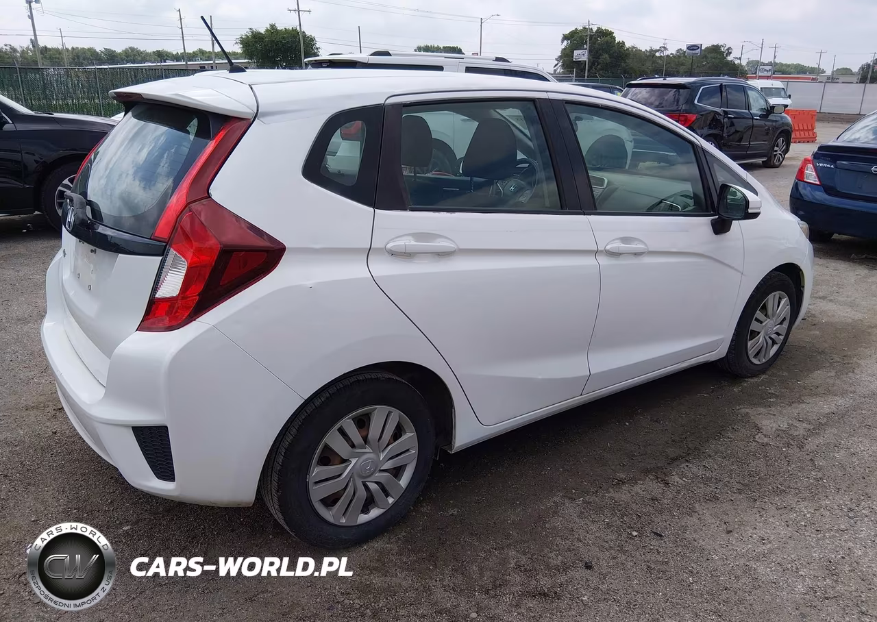 2015 Honda Fit Lx VIN:3HGGK5H59FM709068 - 4