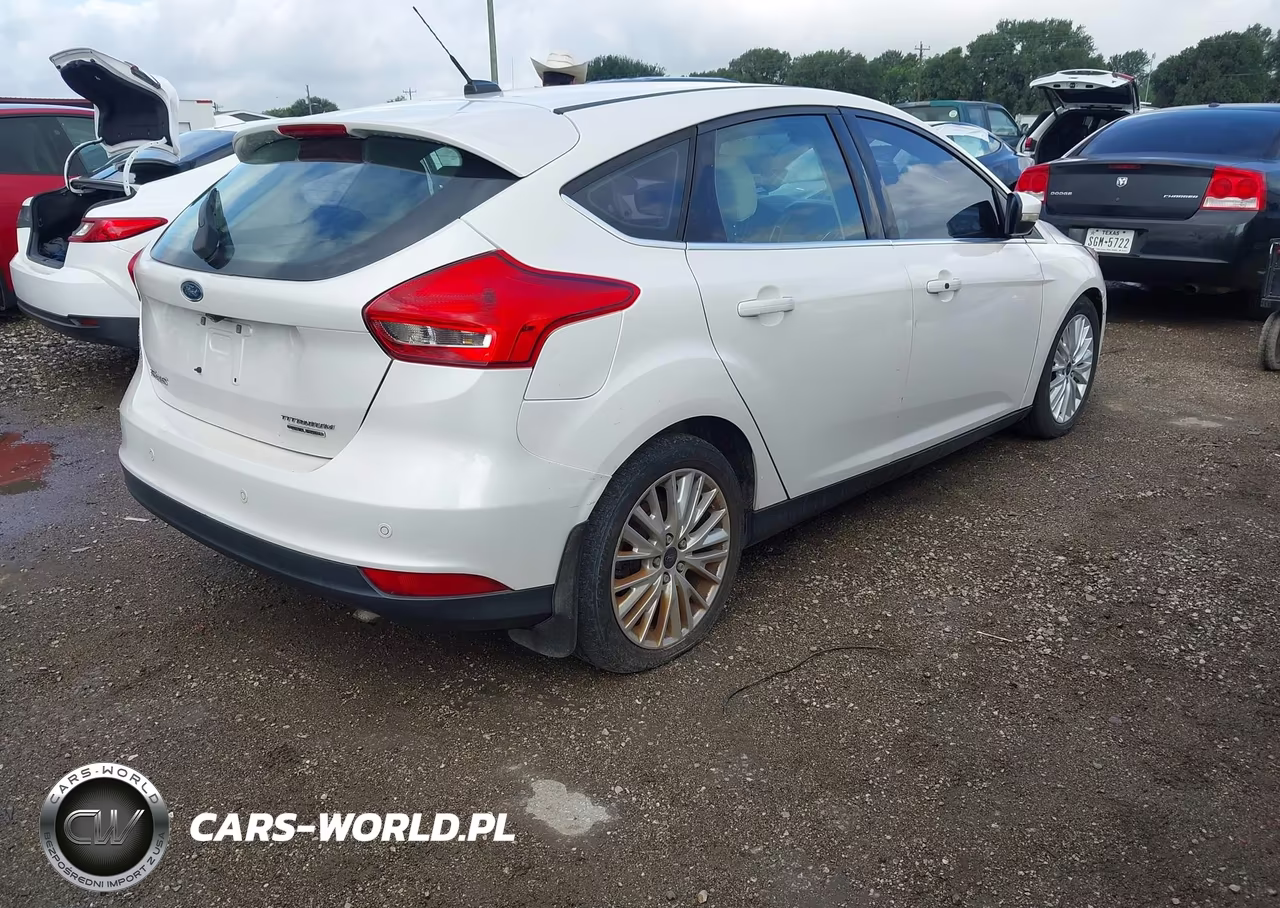 2016 Ford Focus Titanium VIN:1FADP3N26GL252679 - 4