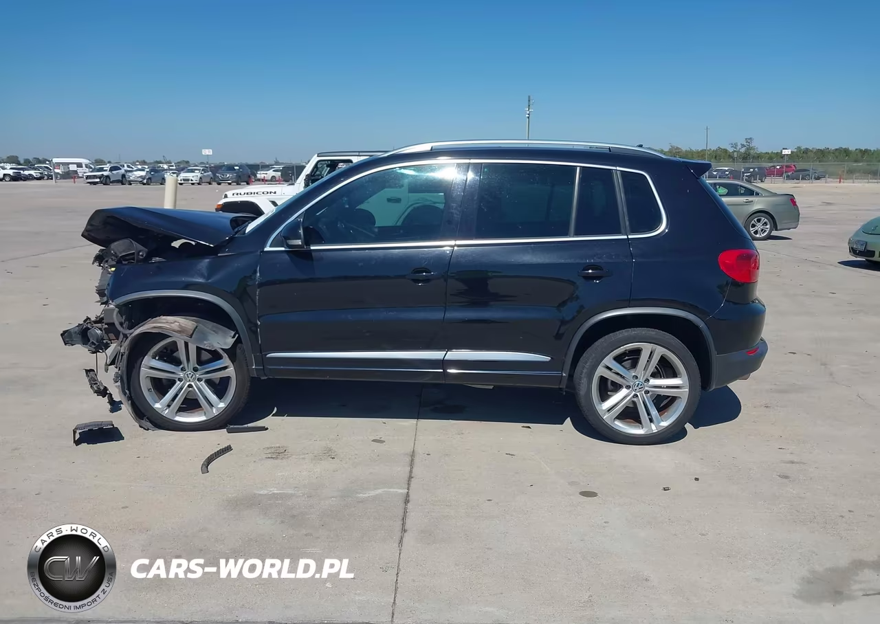2014 Volkswagen Tiguan R-Line VIN:WVGAV3AX9EW055744 - 14