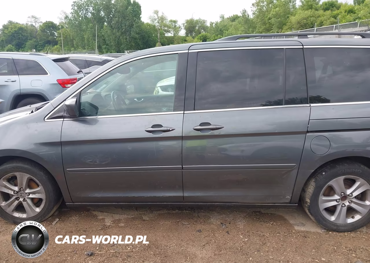 2010 Honda Odyssey Touring VIN:5FNRL3H94AB083969 - 14