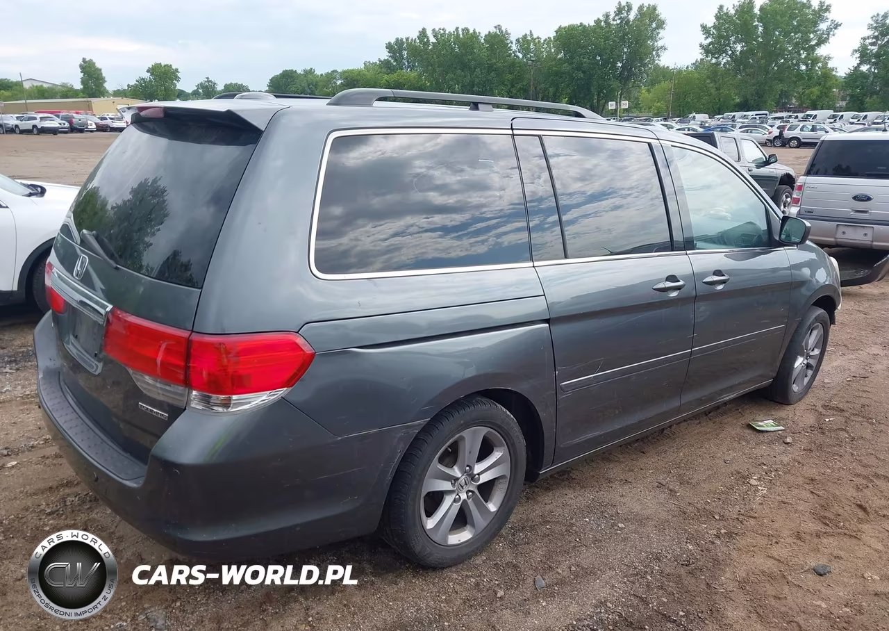 2010 Honda Odyssey Touring VIN:5FNRL3H94AB083969 - 4