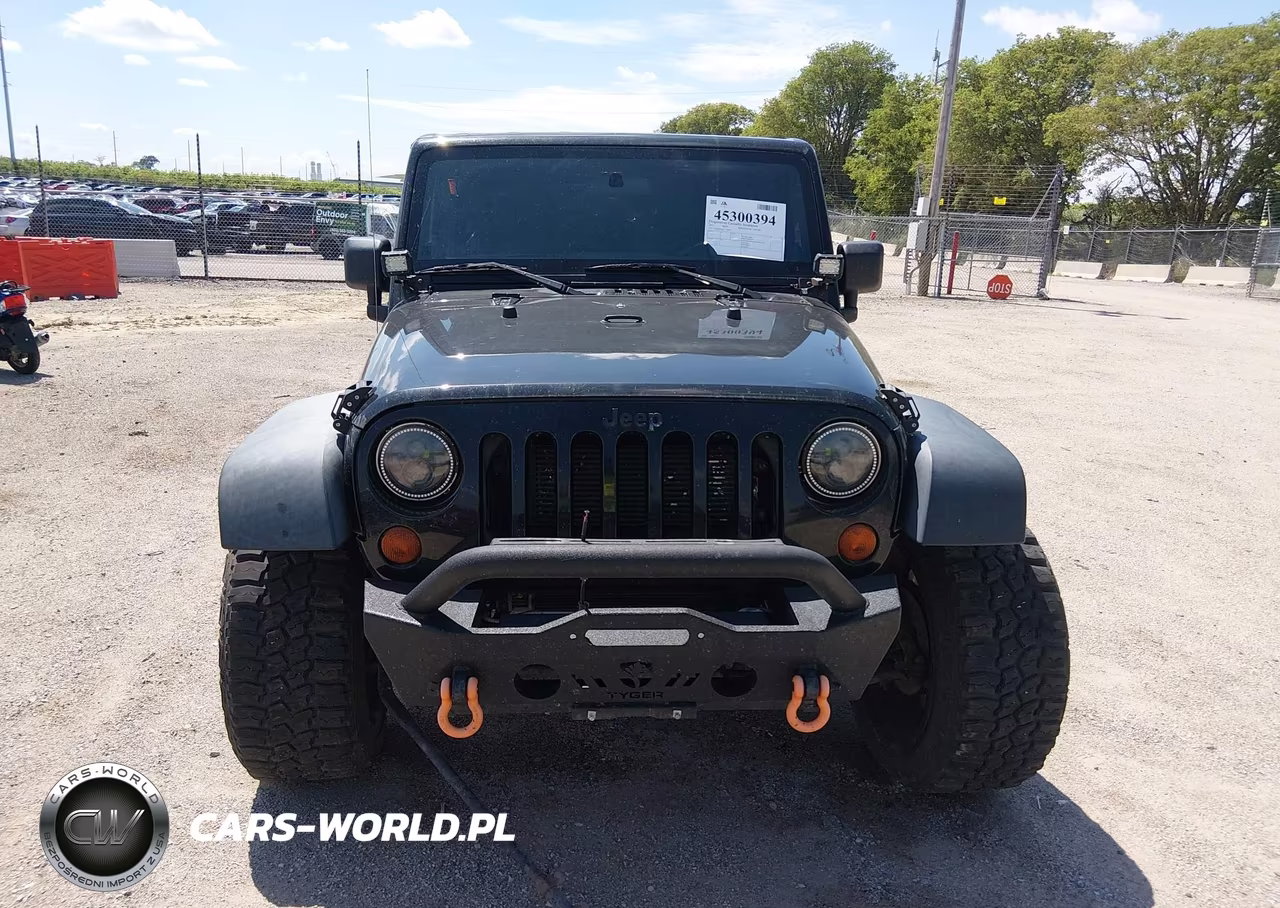 2012 Jeep Wrangler Unlimited Sport VIN:1C4BJWDG8CL200899 - 12