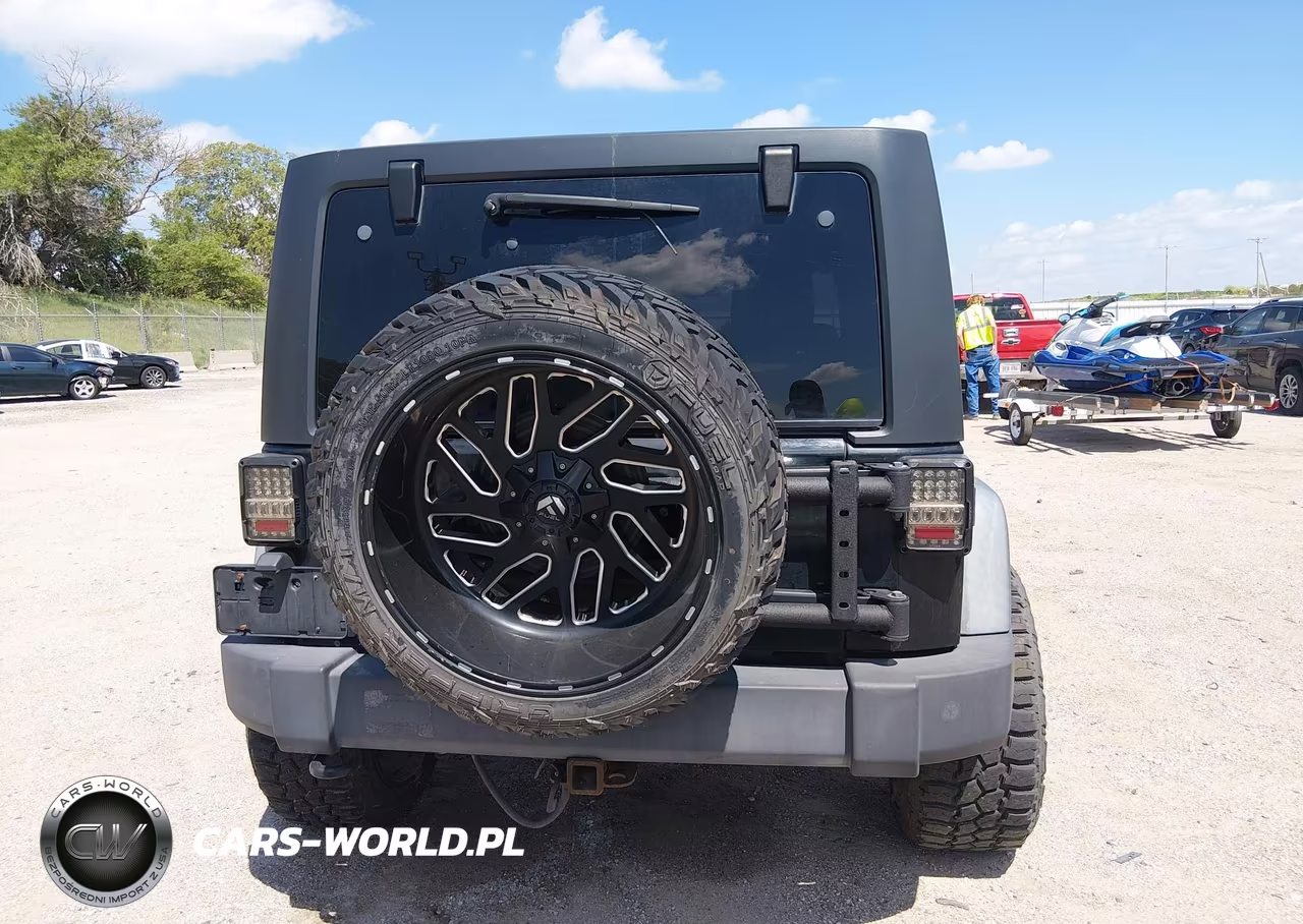 2012 Jeep Wrangler Unlimited Sport VIN:1C4BJWDG8CL200899 - 16