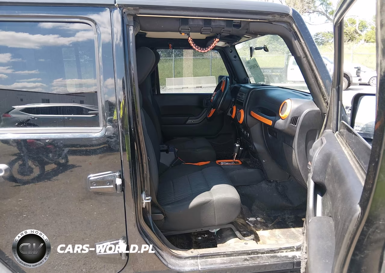 2012 Jeep Wrangler Unlimited Sport VIN:1C4BJWDG8CL200899 - 5