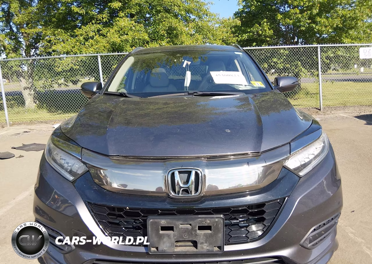2019 Honda Hr-V Touring VIN:3CZRU6H90KM704145 - 12
