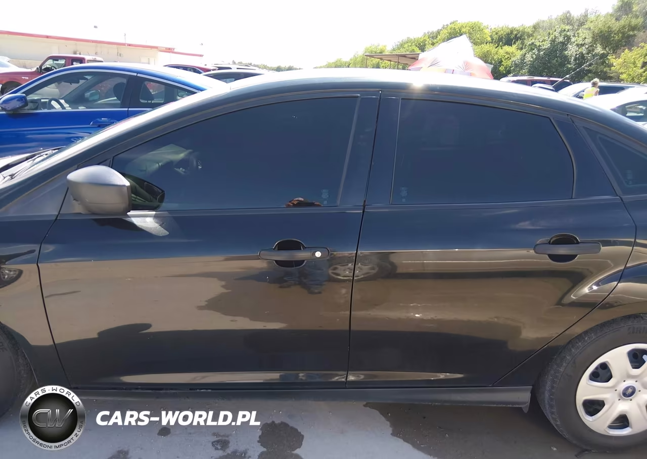 2015 Ford Focus S VIN:1FADP3E22FL215725 - 14