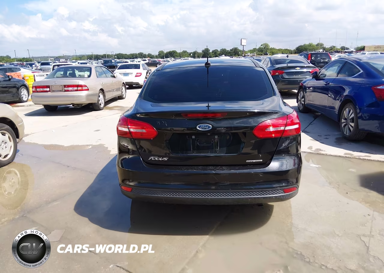 2015 Ford Focus S VIN:1FADP3E22FL215725 - 16