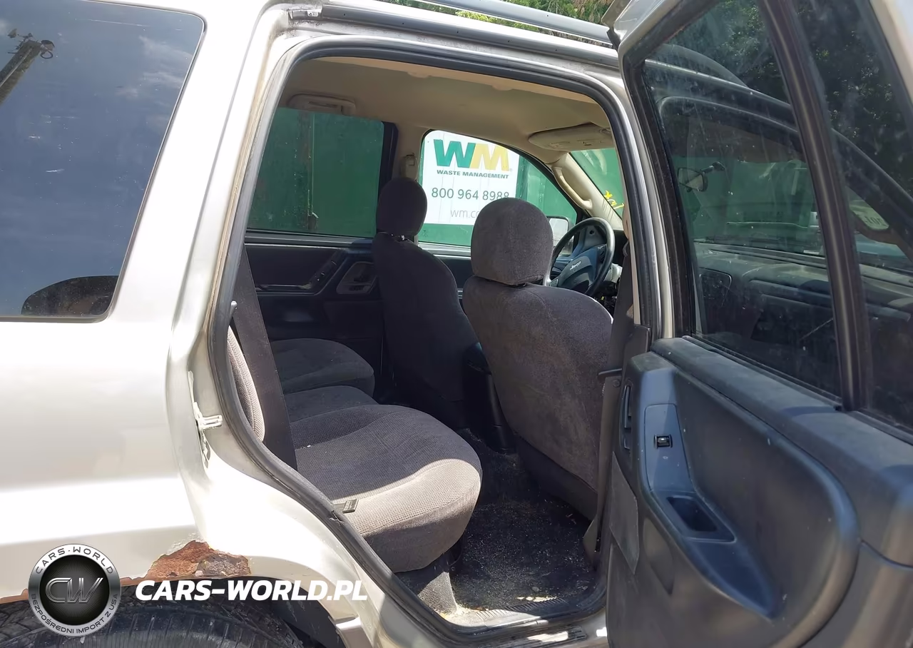 2003 Jeep Grand Cherokee Laredo VIN:1J4GW48S23C539582 - 8