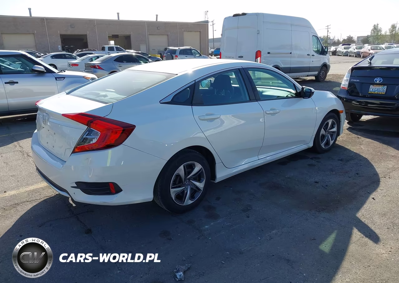 2019 Honda Civic Lx VIN:19XFC2F6XKE214447 - 4