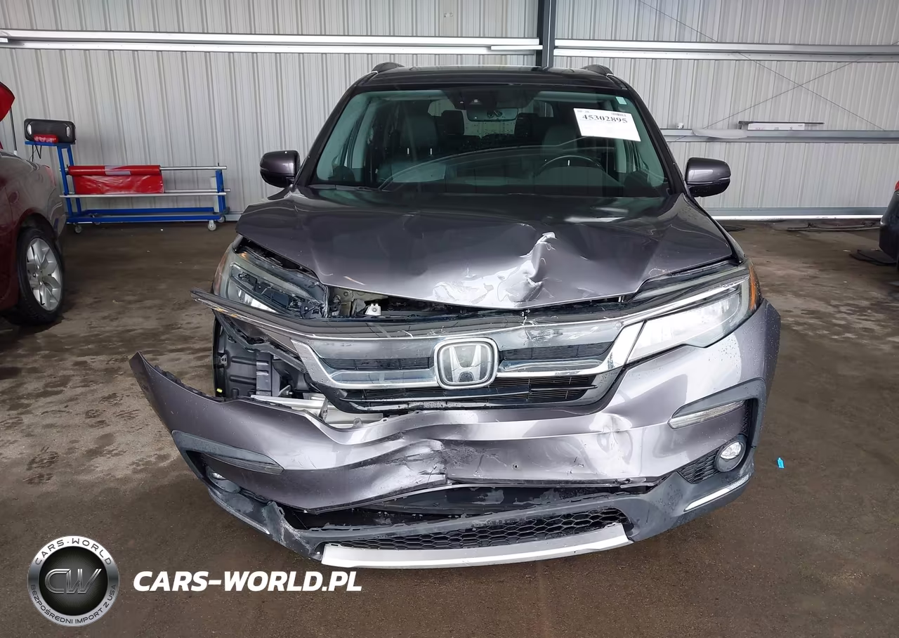 2019 Honda Pilot Elite VIN:5FNYF6H06KB069062 - 6