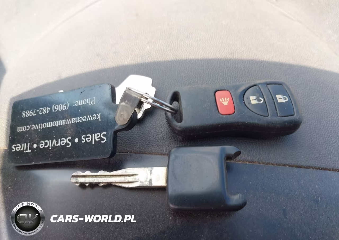 2012 Nissan Titan Pro-4X VIN:1N6BA0CC8CN309098 - 11