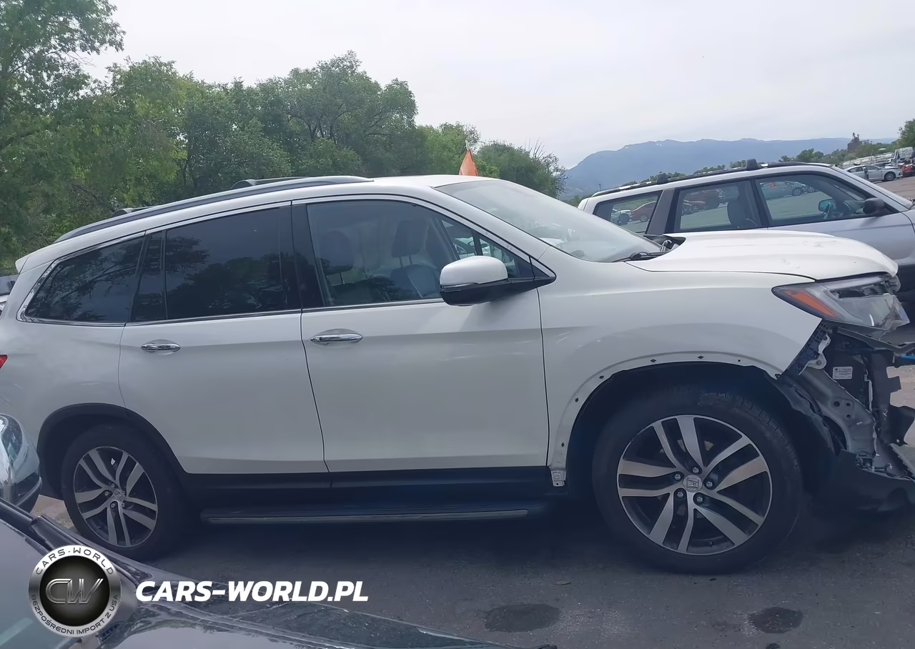 2016 Honda Pilot Elite VIN:5FNYF6H0XGB103320 - 13